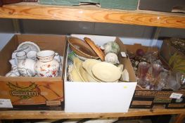 A shelf of glass and china ware