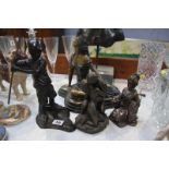 Four bronze style figures