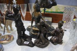 Four bronze style figures