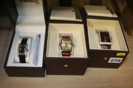 Three boxed Ingersoll watches