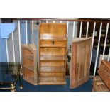 Two pine corner cabinets and a book case