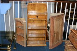 Two pine corner cabinets and a book case