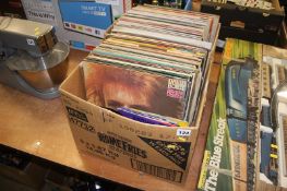 A collection of vinyl records including David Bowie 'Space Oddity'