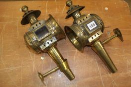 A pair of brass carriage lamps