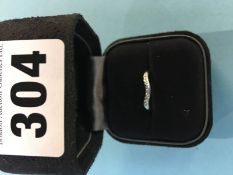 A platinum and diamond ring, by Tiffany and Co., with original box and bag. 3.5g, size 'H'