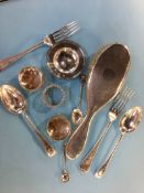 A collection of assorted silver to include cutlery etc.