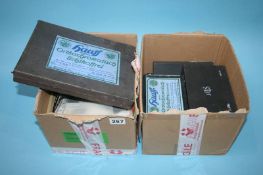 Two boxes of German glass slides and negatives