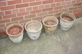 Four terracotta plant pots