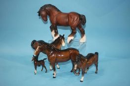 A Royal Doulton 'Shire' horse and four Beswick horses