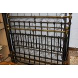 A Victorian cast iron bed frame