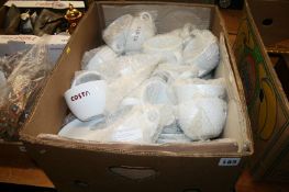 A box of Costa coffee cups and saucers