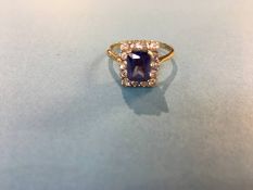 A 9ct diamond and tanzanite ring. 3.9g, size 'K'