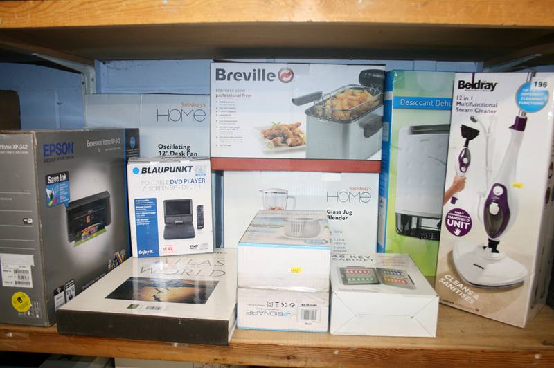A shelf of miscellaneous; professional fryer, steam cleaner etc. (boxed)