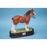 A Royal Worcester 'Clydesdale Stallion' modelled by Doris Lindner, no. 87/500, with certificate