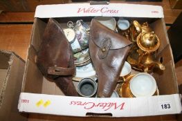 A box of miscellaneous, including leather pistol holsters and china