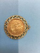 A full sovereign, dated 1882, in 9ct mount, 11.2g