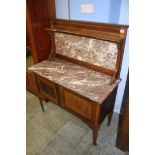 An Edwardian inlaid mahogany and marble wash stand
