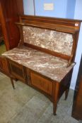 An Edwardian inlaid mahogany and marble wash stand