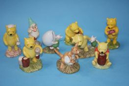 A collection of Royal Doulton 'Winnie the Pooh' figures etc. (9)