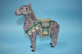 A Famille Verte model of a horse. 26cm tall