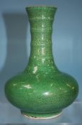 An 18th century style apple green vase. 16cm tall