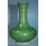 An 18th century style apple green vase. 16cm tall