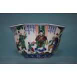 A Famille Verte Chinese dish, seal marks to base. 11.4cm diameter