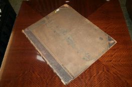 A large leather bound ordnance survey book 'Earsdon Parish'