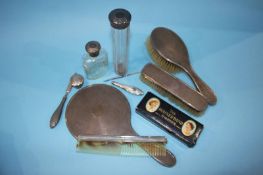 Silver backed brush set, silver top bottles and a mouth organ