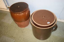 A pair of glazed stoneware flower bins