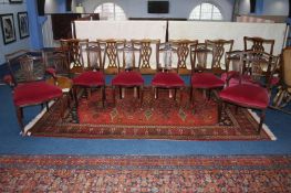 An eight piece Edwardian mahogany part salon suite, comprising four chairs, pair of bedroom chairs