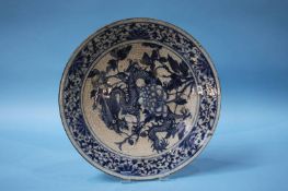 A large blue and white charger, decorated with four claw Dragon. 40cm diameter