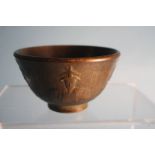 A bronze Chinese wine cup. 8.5cm diameter