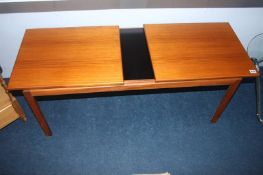 A teak McIntosh extending coffee table