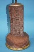 A terracotta Stupa, converted to a table lamp (not including the brass fitting). 36cm tall