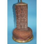 A terracotta Stupa, converted to a table lamp (not including the brass fitting). 36cm tall