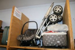 An MPX Travel System pram and accessories