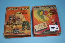 Two books; 'Mickey Mouse and the Bat Bandit' and 'Mickey Mouse and the Magic Lamp'