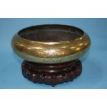 A Chinese shallow circular bowl and stand, 26cm wide