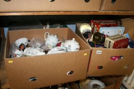 A shelf of miscellaneous, tins etc.