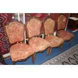 Set of four Victorian carved walnut chairs
