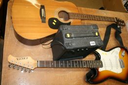 An Encore guitar and Excel electric guitar, amplifier etc.