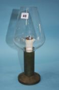 An oil fuelled hurricane lamp