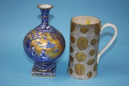 A Portmeirion 'Moss Agate' decorated tankard and a Foley Ware vase (2)