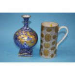 A Portmeirion 'Moss Agate' decorated tankard and a Foley Ware vase (2)