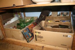 A shelf of miscellaneous, small leather case, glassware etc.