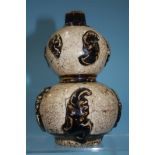 A double gourd Cizhou vase. 18cm tall