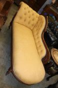A Victorian walnut chaise longue