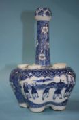 A Chinese blue and white flower vase, with waisted neck, decorated with figures, 24cm height