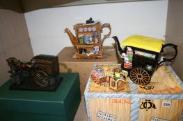 A boxed Ringtons wagon and two boxed teapots